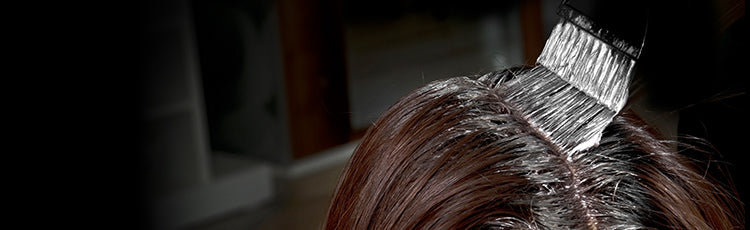 Overhead view of a person getting her hair colored