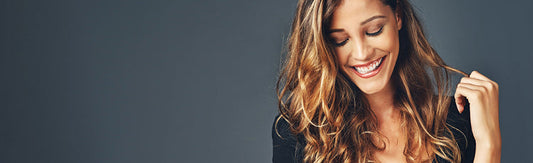 Smiling woman with long brunette hair