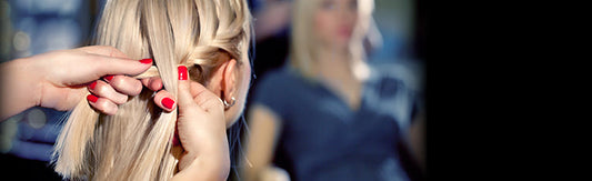 Woman having her hair braided