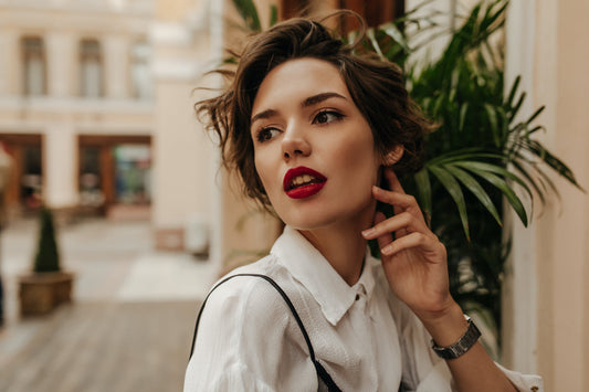 Woman with brown hair sporting a short hairstyle