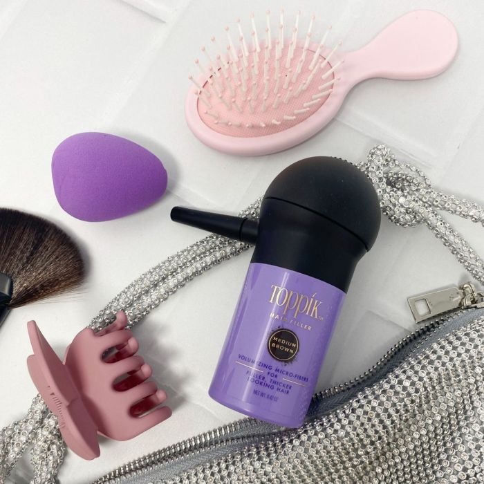 Toppik hair filler volumizing micro-fiber for fuller, thicker looking hair purple bottle with spray applicator 