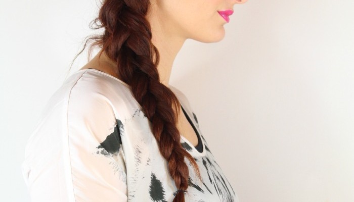 woman low side braid easy travel hairstyle