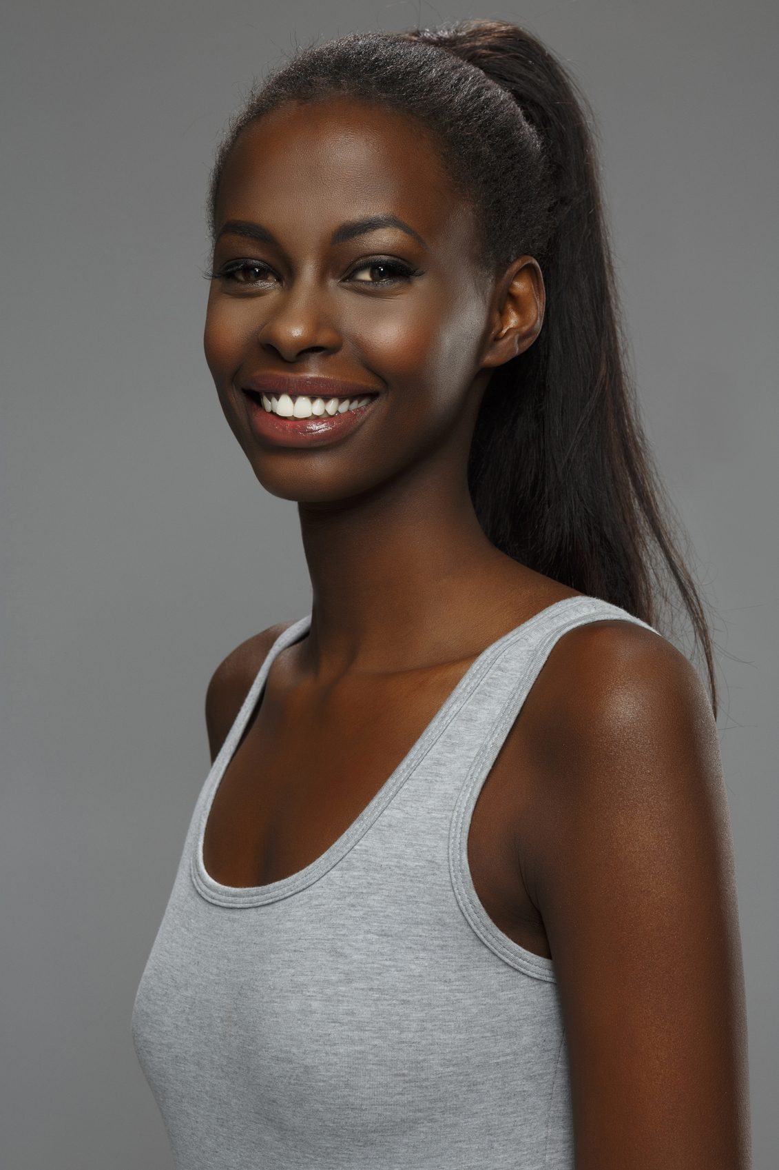 Beauty portrait of beautiful toothy smile  young african ethnicity woman