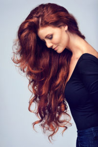 woman-long-red-hair-side-iron-deficiency-hair-loss-anemia