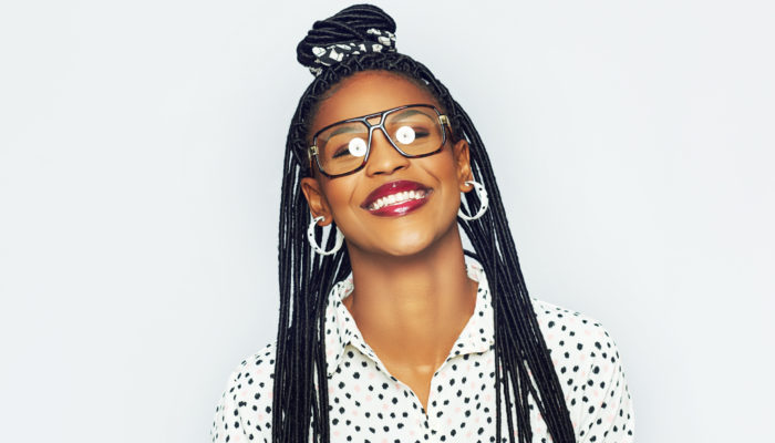 top-knot-half-up-braids-black-woman-easy-travel-hairstyles