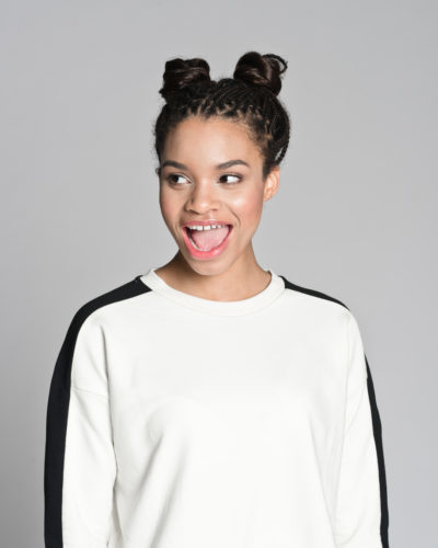 pigtail-buns-african-american-happy-woman-easy-gym-hairstyles-toppik-blog