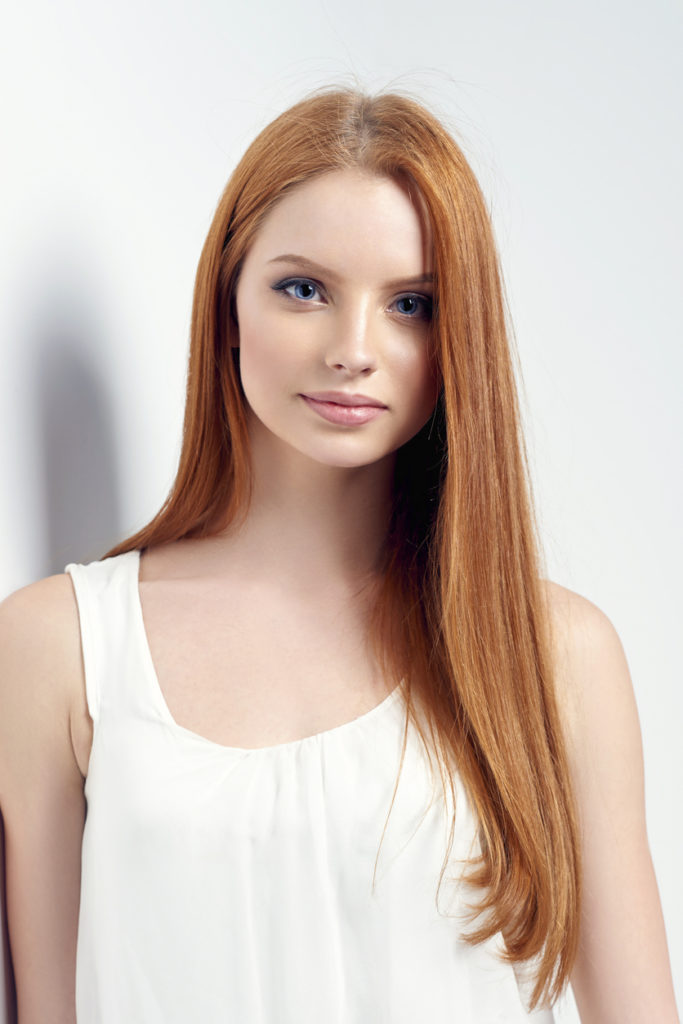 redhead long straight hair oval face best hairstyles face shape Toppik blog