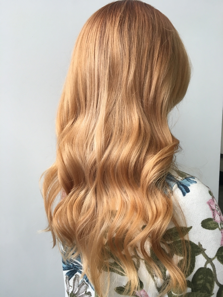 strawberry blonde hair long curly side view choosing hair colors for older women toppik hair blog